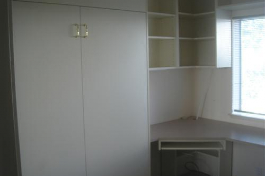 2nd bedroom/office built ins. Yes that is a Murphy bed! Folds up when not in use Resource #211807: image #6