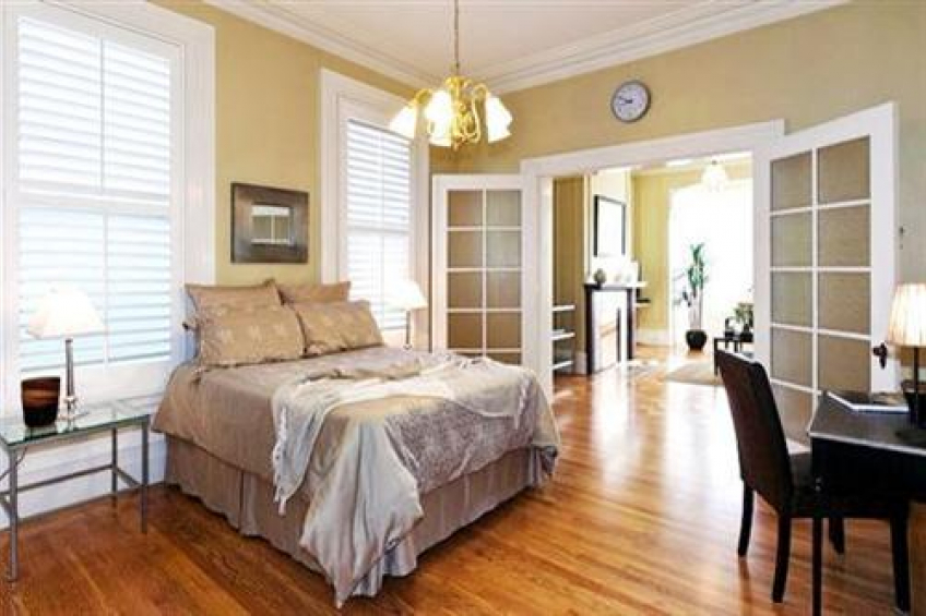 Sun filled parlor has closet. Resource #256667: image #5