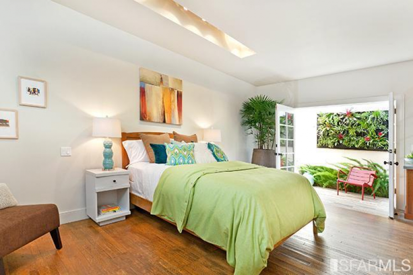 The bedroom area open onto the beautifully landscaped patio. Resource #270649: image #13