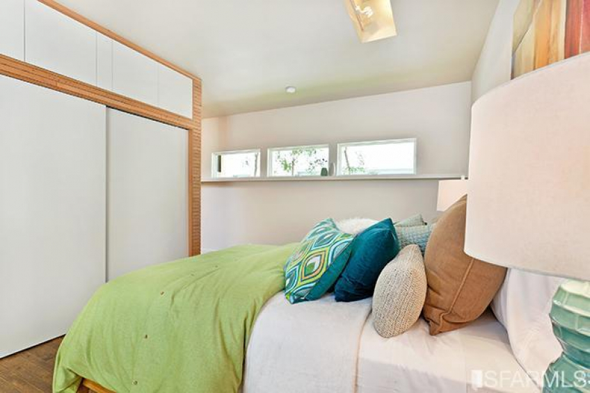 The other side of the central fireplace serves as a closet. Resource #270649: image #14