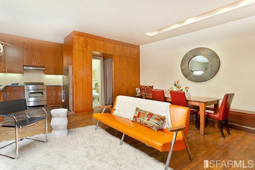 The kitchen, living room, and dining room are functional and well integrated. Resource #270649: image #8