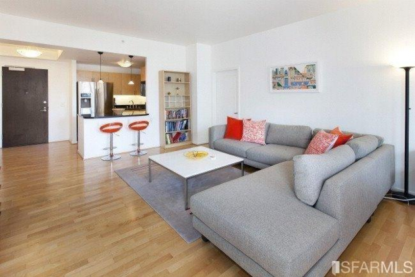 Living area towards kitchen and entry. Resource #289798: image #4