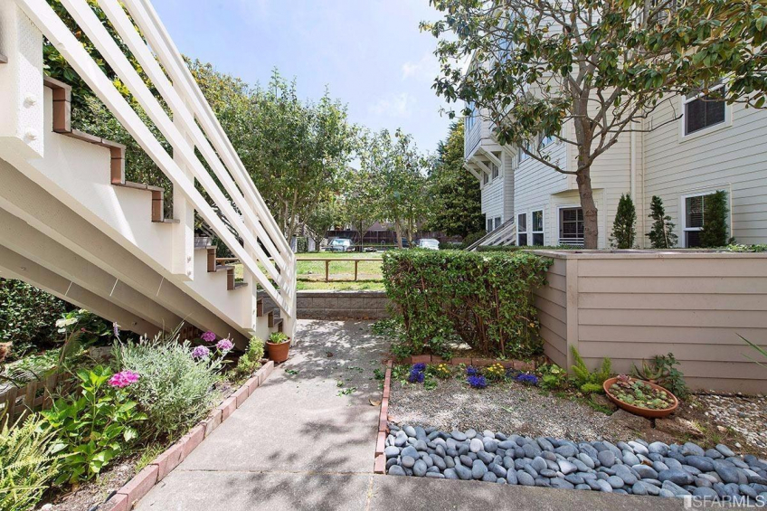 Rear patio. Owner uses this a lot. Straight ahead is the parking spot. Resource #315375: image #25