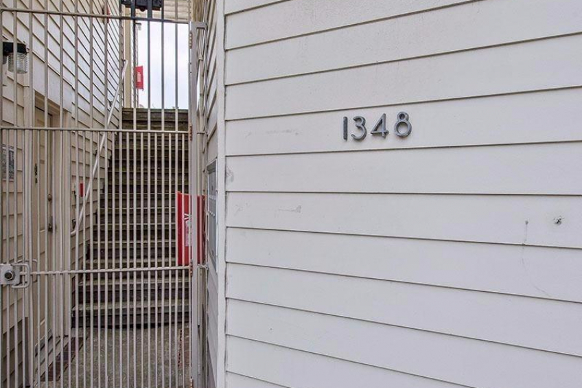 Entry door for this unit is just behind this gate. Very easy to access from the street and from the parking which is in the rear of the unit. Feels more home like. Resource #315375: image #27