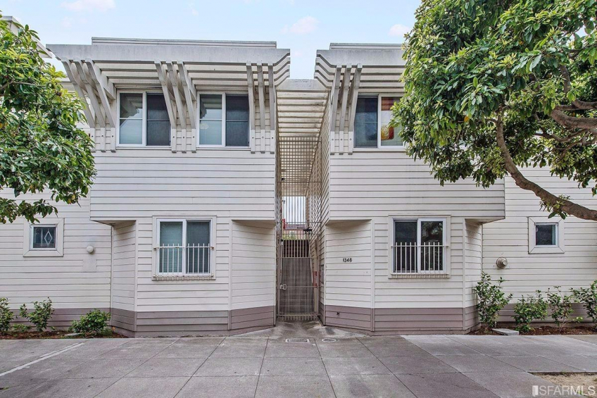 Part of a well maintained HOA with plantings. This is not your cookie cutter high rise. Feels like a home. Pictured is your entry gate. The unit is right on the right hand side. No stairs in. Resource #315375: image #3