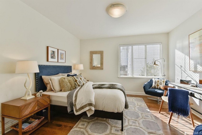 The second bedroom on the main level that overlooks the garden/patio. Resource #323377: image #18