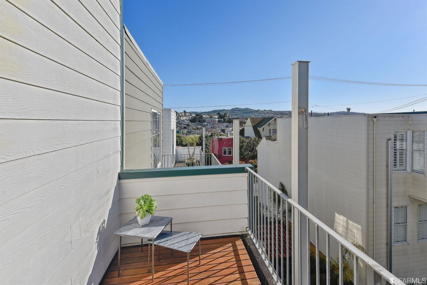 The deck that is adjacent to the master bedroom. Resource #323377: image #25