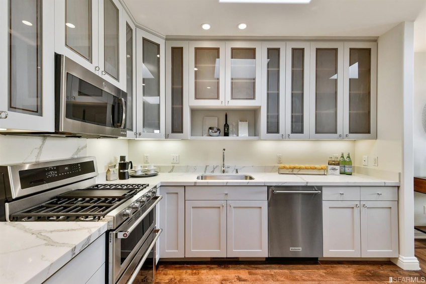 Updated gourmet kitchen with beautiful counter tops and stainless steel appliances. Resource #323377: image #9