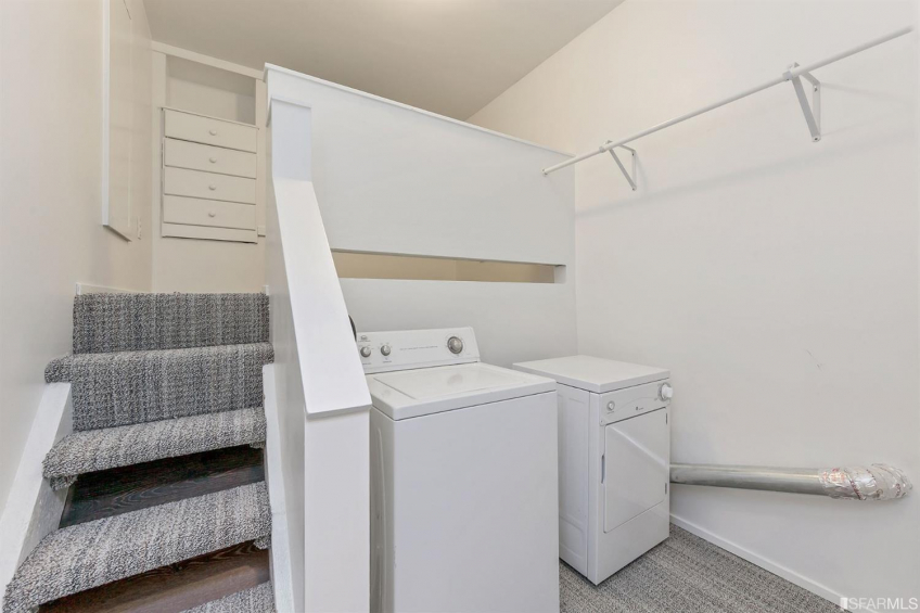 Private laundry room for downstairs. Check out the neat bonus space behind washer/dryer for extra storage or play space! Garage also has washer/dryer for upstairs. Resource #337080: image #28