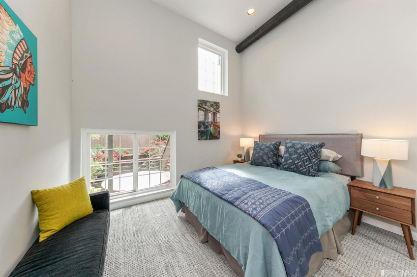 The main bedroom downstairs. Soak in the high ceilings and garden views. Resource #337080: image #30