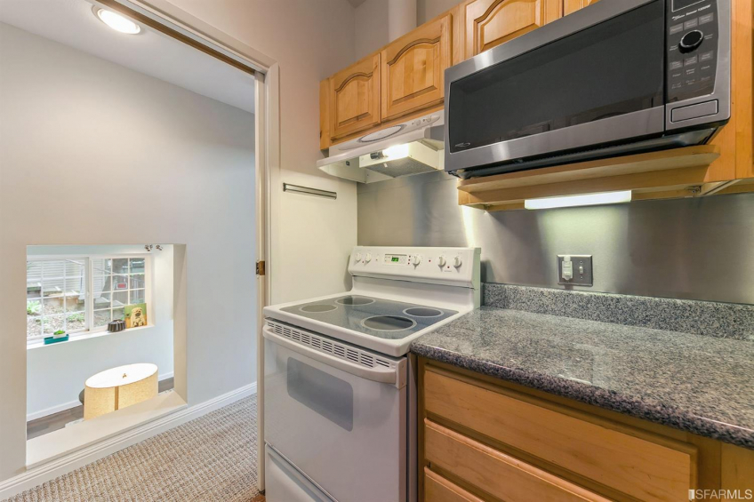 Downstairs also offers a complete kitchen. Resource #337080: image #33