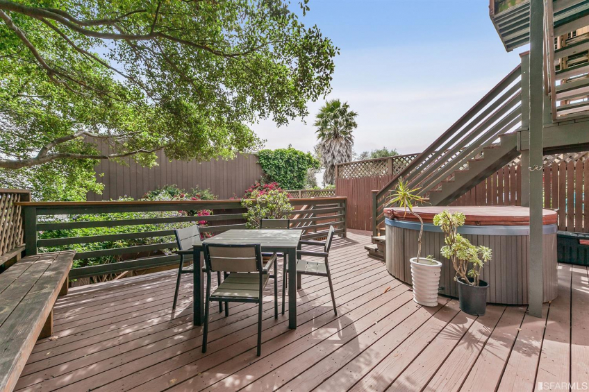 Main deck offers plenty of space for entertaining, sunning, eating, and beyond. Get ready for some hot tub fun! Note the hot tub is chemical-free! Resource #337080: image #37