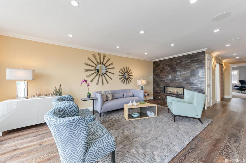 Open top-floor living room. Note the floating gas fire place. Resource #337080: image #8