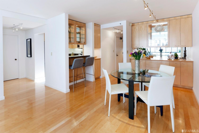 Dining area with lots of custom lighted cabinets. Storage for everything not to mention lots of light. Resource #337487: image #5