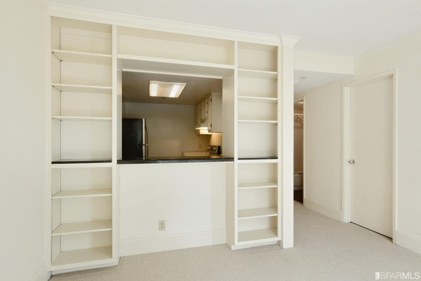 Wonderful custom built in floor to ceiling shelving Resource #342571: image #4