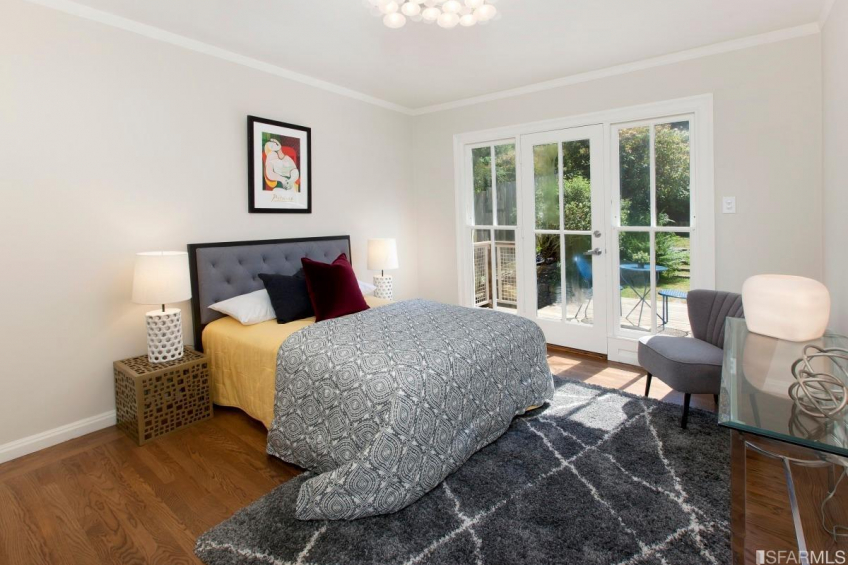 Bedroom # 1 in the rear of the home overlooking the leafy green backyard. Resource #349379: image #11