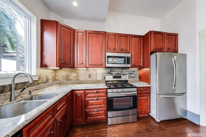 246 Middle Flat: Expansive kitchen w custom Brazilian cherry cabinets Resource #375029: image #10