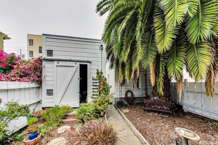 TWO additional parking spaces in these covered garages ... or media room? meditation space? work from home? OR build a new unit here for extra space and income! Resource #375029: image #36
